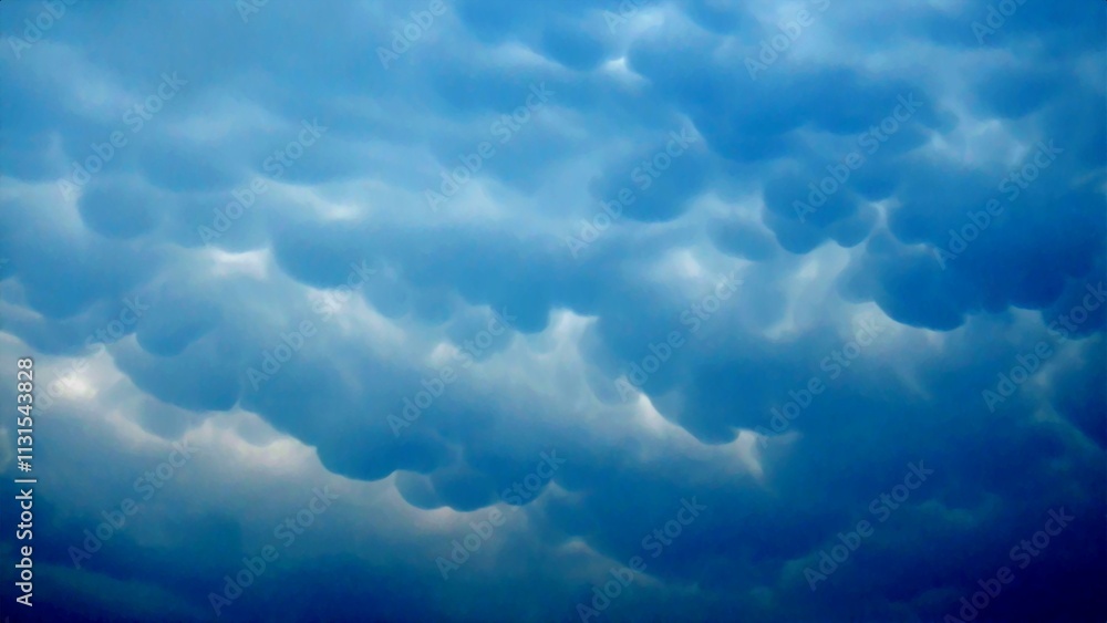 Aufkleber sky with texture of mammatus clouds - abstract composition in shade of blue. topics: cloudy backgrou