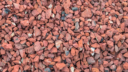 Small pieces of red clay bricks or Aggregates of bricks for making concrete	