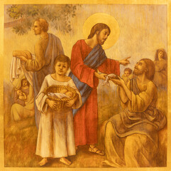 PAVIA, ITALY - SEPTEMBER 8, 2024: The painting of Miralce The Feeding the multitude in the church...