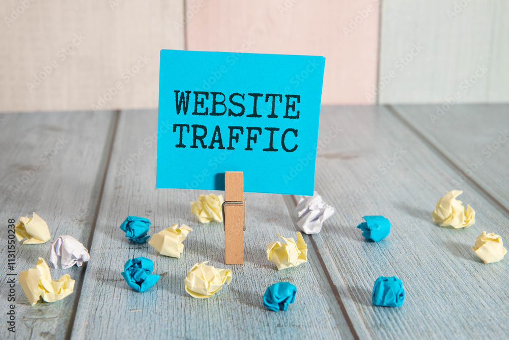 Poster memo note written with text website traffic isolated on green background.