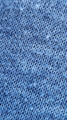 Close-up of blue knitted fabric texture