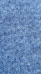 Close-up of blue knitted fabric texture
