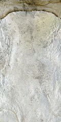 Close up of natural stone texture background. High resolution photo. Full frame. Abstract background and texture for design. Fossilized rock. Molten silver ingot, white metal.