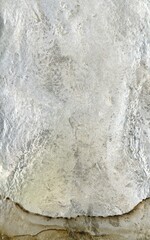 Close up of natural stone texture background. High resolution photo. Full frame. Abstract background and texture for design. Fossilized rock. Molten silver ingot, white metal.