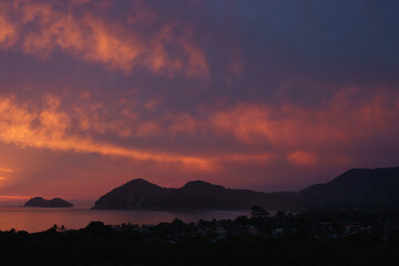 S&atilde;o Sebasti&atilde;o, S&atilde;o Paulo state, Brazil - January 8th, 2024 - View of whale beach with dramatic sunset.