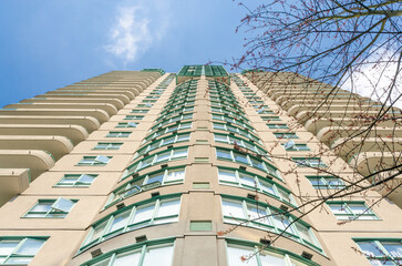 Modern apartment building with nice summer landscape in Vancouver, Canada, North America. Day time...