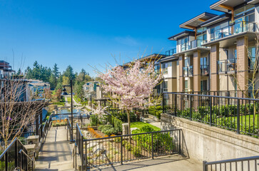 Modern apartment building with nice summer landscape in Vancouver, Canada, North America. Day time...