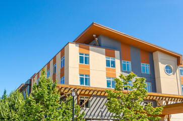 Modern apartment building with nice summer landscape in Vancouver, Canada, North America. Day time...