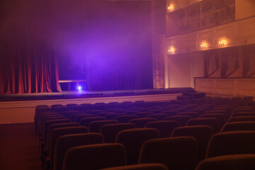 Professional spotlight and smoke on stage in theatre