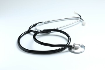 Fototapeta premium Stethoscope with pills and clipboard on white background