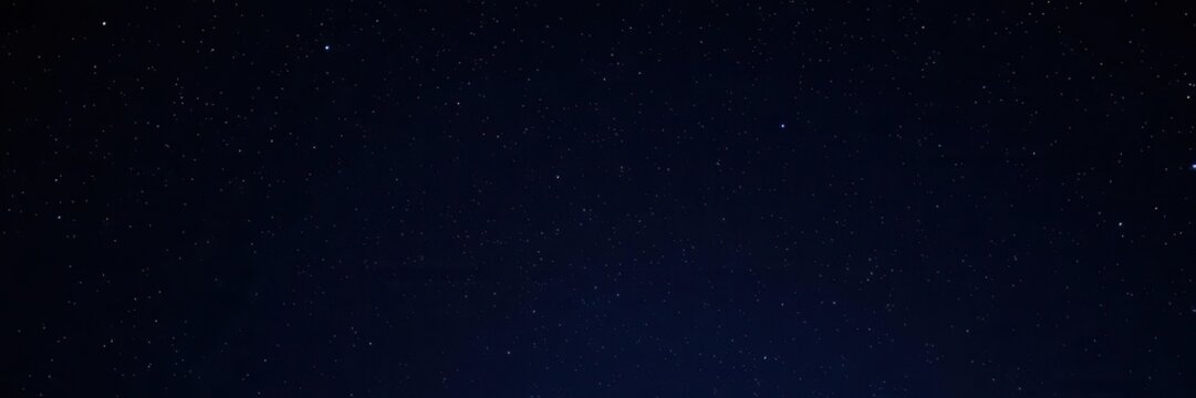 Starry night sky full of sparkling stars against a black background, night time, stars