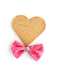 gingerbread in the shape of a heart on a white background