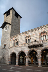 Obraz premium Tourist destination small medieval village of Como with hilly narrow streets and luxurious villas, holiday destination on Lake Como, Italy in spring