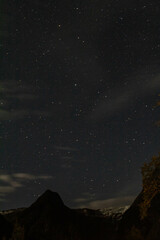 A stunning night shot of Jostedalsbreen Glacier, with a star-filled sky above. 