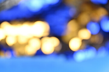 Golden and Blue Glitter Fusion: A Captivating Macro Shot of Sparkling Sequins and Glittery...