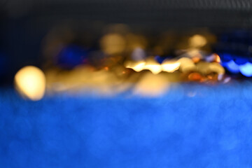 Abstract Blur of Blue and Gold Lights: A Dreamy Out-of-Focus Composition Highlighting Vibrant Blue Tones and Warm Golden Glow, Perfect for Creating a Sense of Elegance, Motion, and Modern Minimalism i
