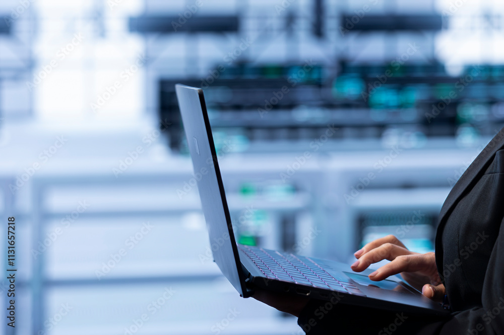 Poster software developer in data center making sure rackmounts are functioning optimally. close up of spec
