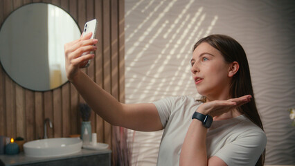 Caucasian woman beauty blogger vlogger model influencer selfie photo mobile phone social media...