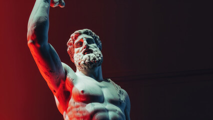 Ancient marble statue of a bearded figure in dramatic lighting