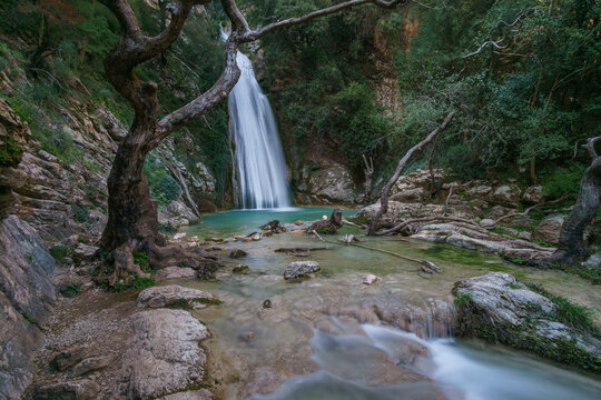 Beautiful natural waterfall of Neda with pool of torquoise water in the rural countryside, Phigalia, Peloponnese, Greece