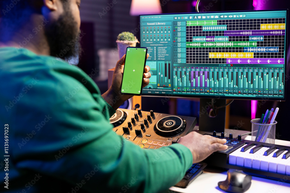 Aufkleber producer using stereo console to apply mixing and mastering techniques, having a copyspace display o