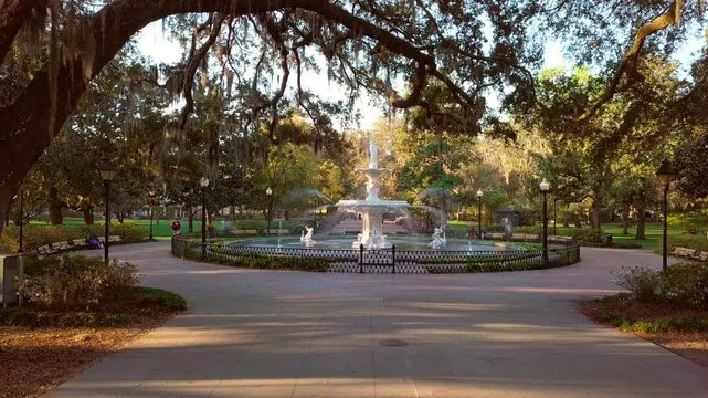 Slider shot of the fountain at Forsyth Park in Savannah, Georgia at sunrise.