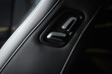Explore the intricate functions of premium luxury car seat control buttons in detail