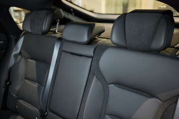 Car back seat with headrest and arm rest, a comfortable automotive fixture