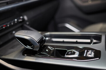 Naklejka premium Macro shot of a car gear lever an essential auto part