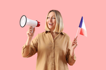 Female French language teacher with flag and megaphone on pink background