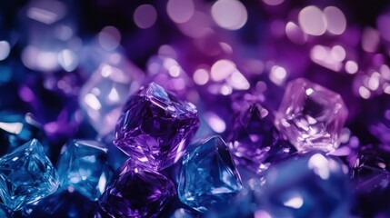 Close-up of vibrant purple and blue crystals with bokeh background.