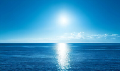 Obraz premium A serene ocean view under a bright sun, showcasing tranquility and natural beauty.