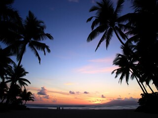 Obraz premium Tropical palm trees silhouetted against a colorful sunset on a paradise beach, paradise, palm trees