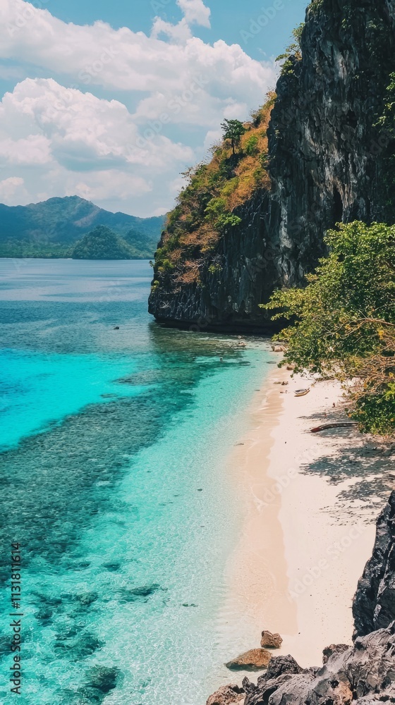 Poster nestled between towering cliffs, this stunning beach features crystal-clear waters gently lapping th