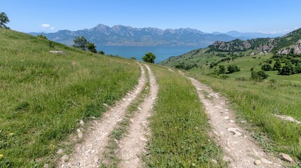 Obraz premium Scenic Mountain Lake Dirt Road Summer Landscape