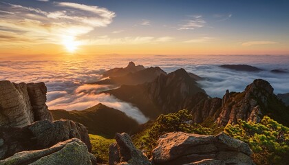 Obraz premium photography of mountain views at sunset with a sea of ​​clouds