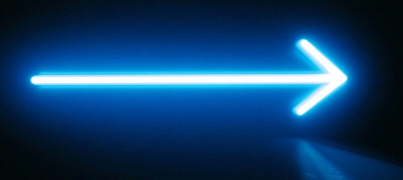 glowing blue arrow on dark background symbolizes direction and technology. This vibrant design evokes sense of movement and innovation, perfect for modern themes