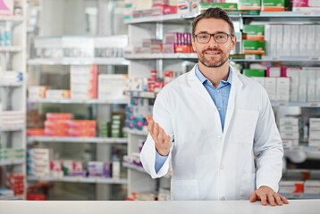 Smile, welcome and portrait of man in pharmacy with healthcare, drugs and prescription medicine in...