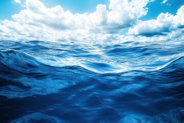 Fototapeta premium Serene ocean waves under a bright blue sky.