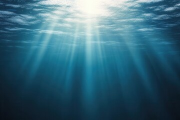 Obraz premium Sunlight filtering through ocean water, creating a serene scene.