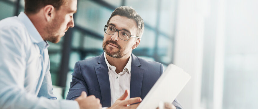 Businessmen, finance and tablet with meeting on banner for online investment, stock market research or trading at office. Business people, broker or accountant with investor for financial proposition