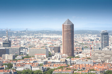 Naklejka premium Aerial panoramic view of Lyon with the skyline of Lyon skyscrapers visible in background during a sunny blue sky afternoon. Lyon is the second biggest city of france and a major economic hub.