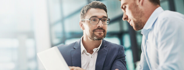Tablet, meeting and business men in office with research for online stock market investment....