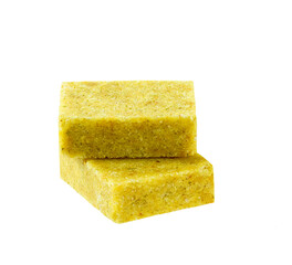 Two chicken bouillon cube isolated on a white background.