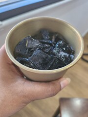 Cola drink with ice cubes
