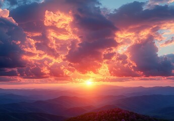 Breathtaking Sunset Over Mountain Range with Colorful Clouds, Vibrant Sky, and Majestic Horizon View Captured in Early Evening Light