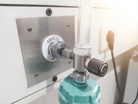 Close up the flowmeter regulator oxygen on the patient room in the hospital.