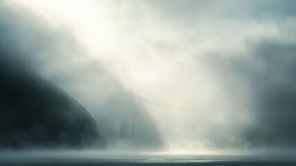 Obraz premium Golden Gate Bridge enveloped in mist, with sunlight breaking through the fog