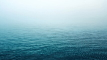 Obraz premium Tranquil Seascape With Gentle Waves and Soft Horizon in Blue Tones
