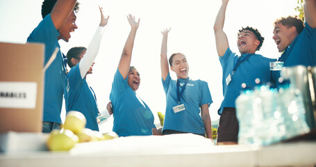 Cheering, volunteers and success for charity, group and celebration for fundraiser, team and...